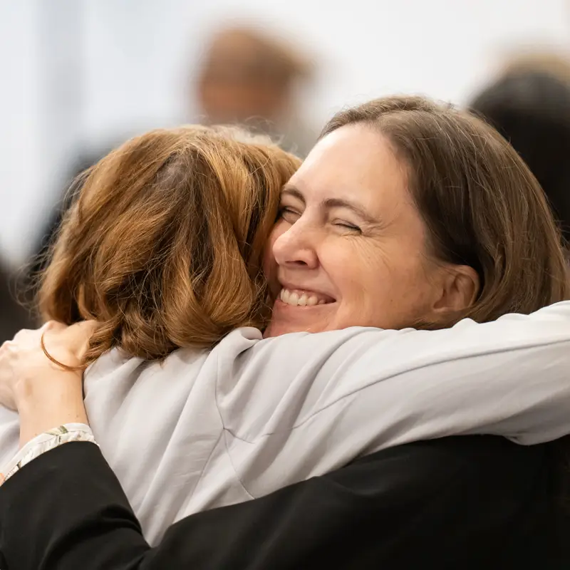 Two people hugging